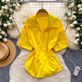 Korean-inspired, design-forward, cinched-waist blouse for women. spring collection, short-sleeved, relaxed-fit, open-front cardigan. elegant and sophisticated, with a touch of french flair