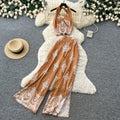Vacation-style printed halter sleeveless dress women's summer lazy high-waisted wide-leg pants two-piece set - premium feel