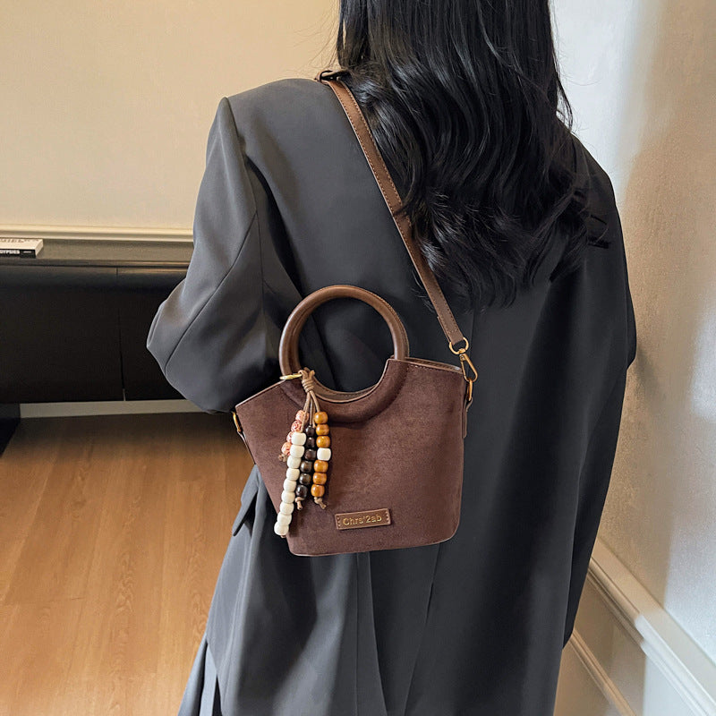 Super hot retro fashion bucket bag 2025 autumn niche design leopard print elegant handbag trendy versatile shoulder bag