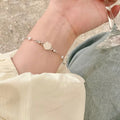 Korean style pearl camellia flower bracelet - women's lightweight luxury, niche, exquisite, high-end, versatile jewelry - wholesale trendy accessories