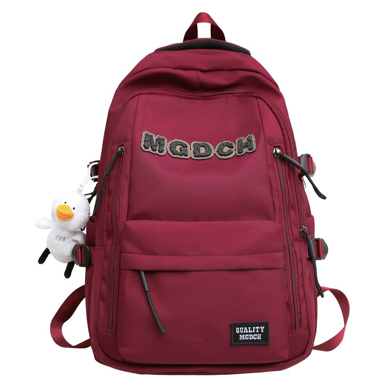 New schoolbag male college students large capacity high school junior high school students fashion versatile casual wear-resistant backpack letter bag