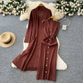 Elegant and chic: oversized knit cardigan with midi length + sleeveless bodycon dress with metallic buckle detail