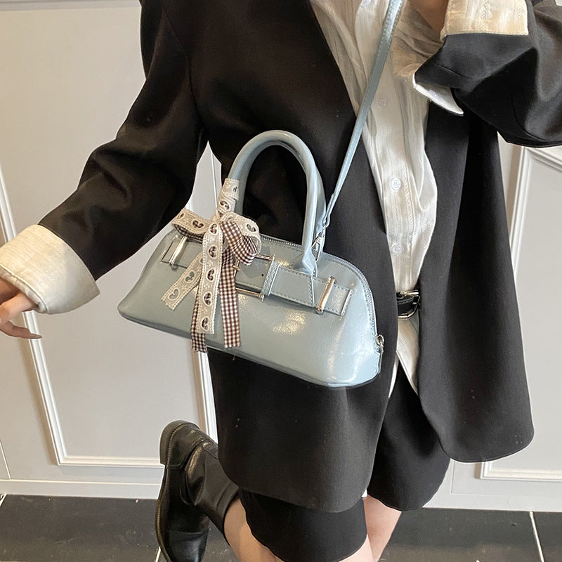 Dopamine girl hand shell bag 2025 spring and summer new Korean version shoulder bag fashion niche casual shoulder bag
