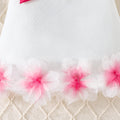 girls' solid color sleeveless party dress with 3d floral hem and bow detail