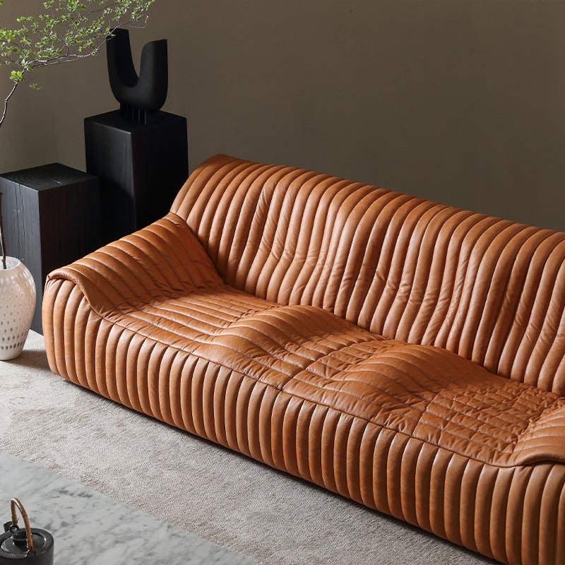 Minimalist mid-century modern genuine leather sofa for living room, homestay, designer american retro oil wax leather caramel color wavy sofa