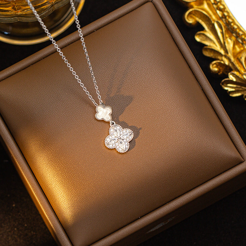 Copper inlaid zirconium four-leaf clover necklace for women, titanium steel real gold plating popularinsfashion flower exquisite sweater chain jewelry