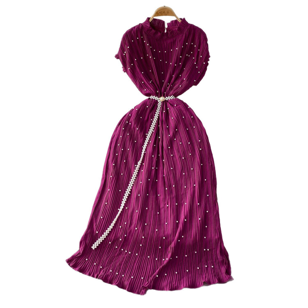 Elegant and sophisticated, this heavy-beaded, ruffled-edge, round-neck dress is a stunning new addition to your summer wardrobe. designed to flatter, it features a cinched waist and a slimming silhouette, finished with a pleated maxi skirt