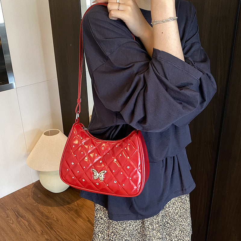 Foreign style simple rhombus single shoulder armpit bag women 2025 new high-end niche diamond-encrusted messenger bag wholesale