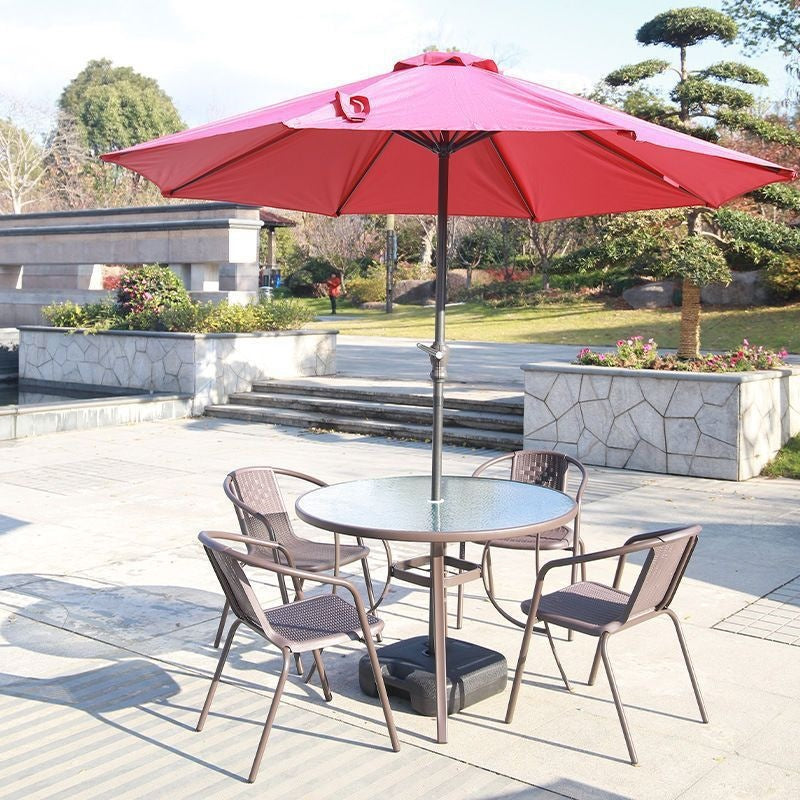 Outdoor table and chair set with umbrella, sunshade, perfect for outdoor cafes, bubble tea shops, and casual outdoor seating. features a wrought iron frame and rattan chairs, ideal for patios and gardens