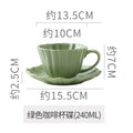 Green coffee cup and saucer