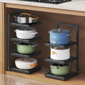 Floor-standing kitchen pot storage rack with adjustable layer spacing and corner sink storage for home use