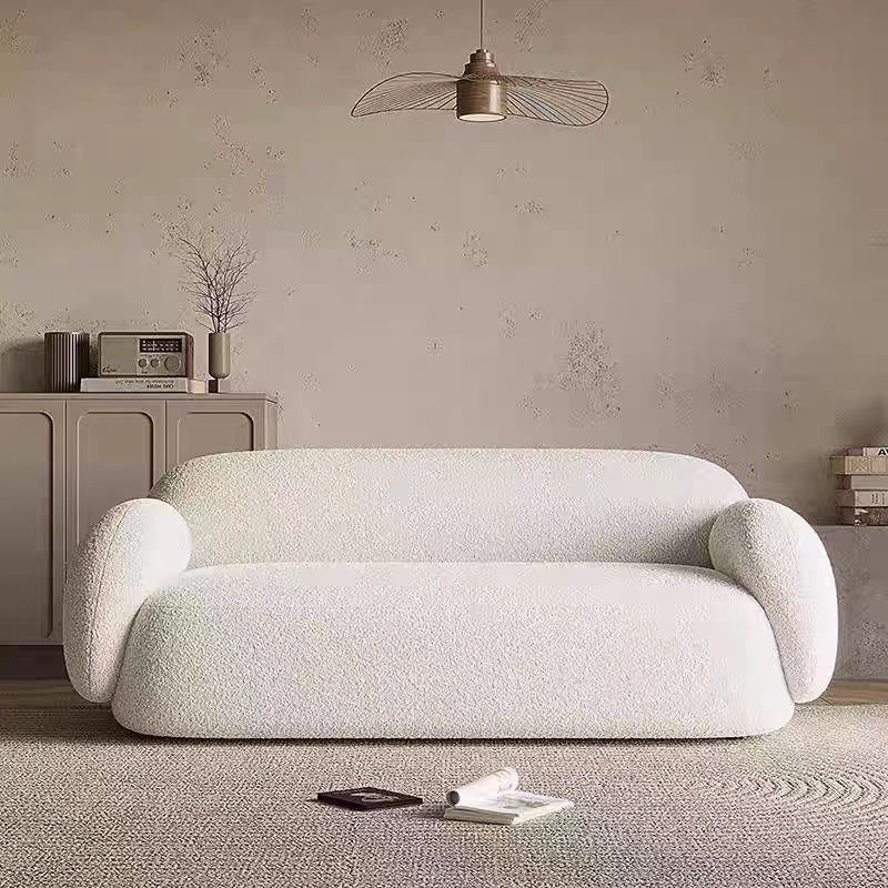 italian minimalist curved fabric sofa, perfect for small apartments. unique, creatively designed living room sofa in teddy velvet fabric