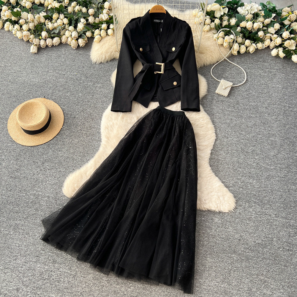 Elegant and chic chanel-inspired two-piece set: women's autumn outfit featuring a tie-waist cardigan and mesh skirt