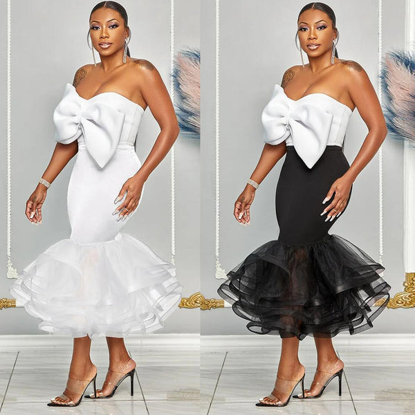 K2825 European and American, sexy, slim-fitting contrasting color tube top bow mesh hip skirt set