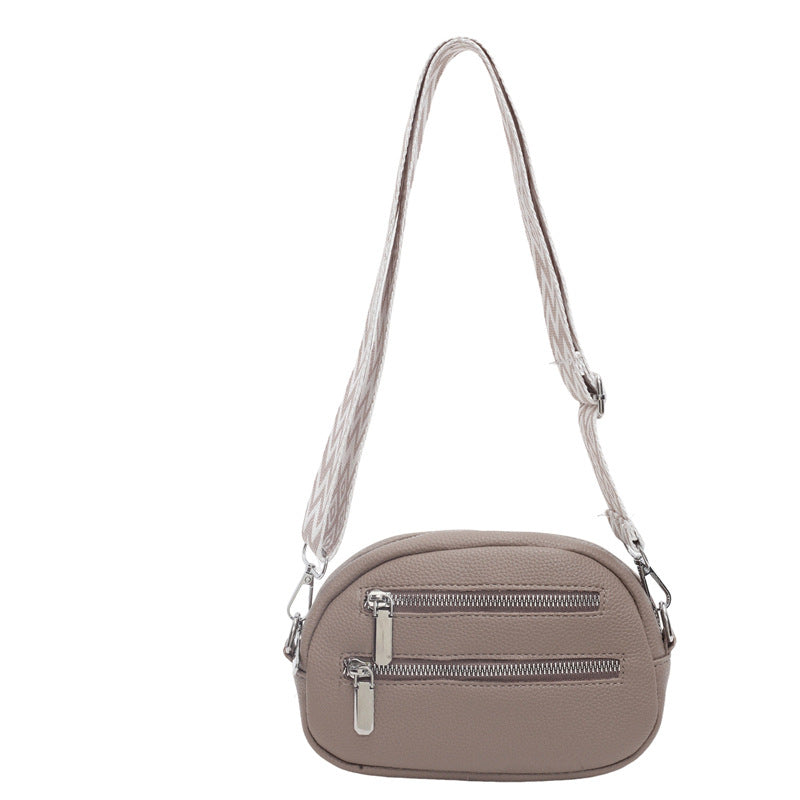 Cross-border Korean version of the new girl's mobile phone breast bag, simple pu messenger bag, trendy fashion zipper women's shoulder small round bag