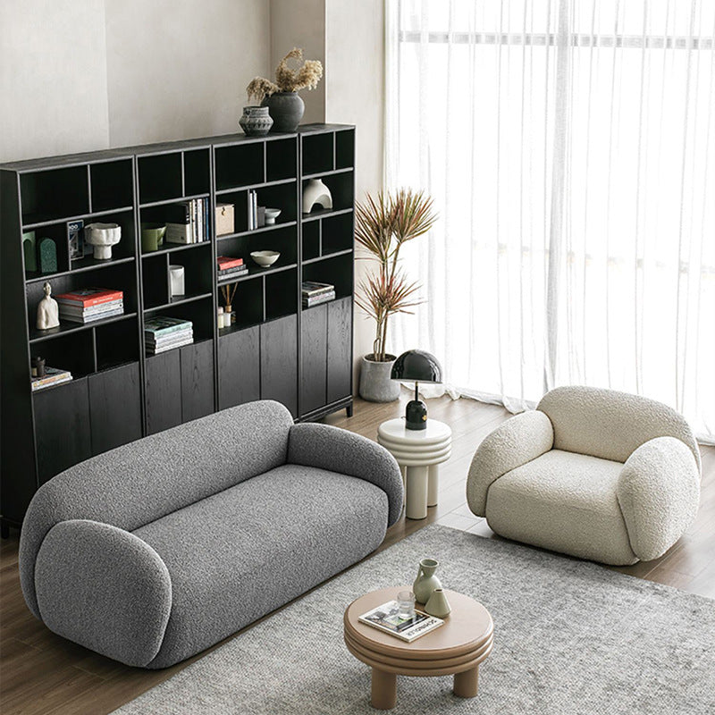 italian minimalist curved fabric sofa, perfect for small apartments. unique, creatively designed living room sofa in teddy velvet fabric