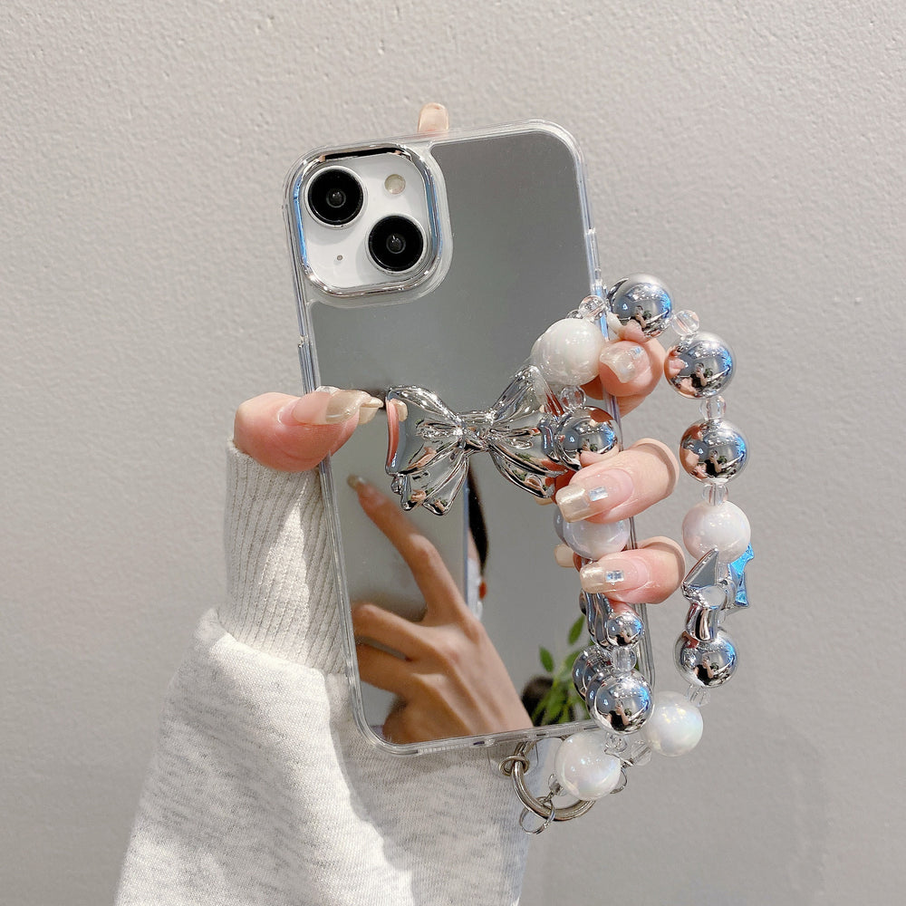 Mirror-finish apple 16 pro silver bowknot phone case, iphone 15/12 compatible, anti-drop hard protective case with wrist strap