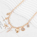 Amazon's hottest retro cross heart clavicle chain niche accessible luxury diamond-encrusted imitation pearl bow necklace for women