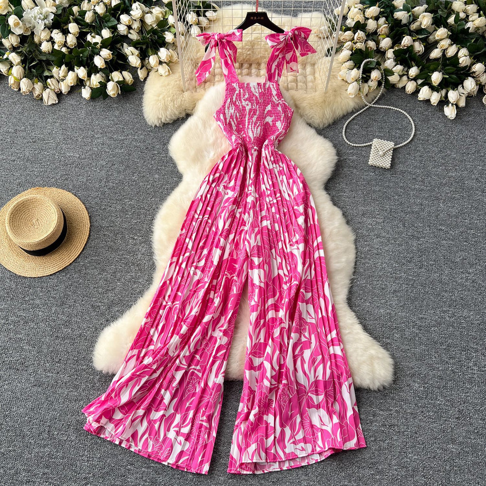 Women's summer jumpsuit for travel & vacation: stretchy, ruched, cinched waist, floral print, spaghetti strap, wide leg, long pants, beachwear