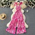 Women's summer jumpsuit for travel & vacation: stretchy, ruched, cinched waist, floral print, spaghetti strap, wide leg, long pants, beachwear