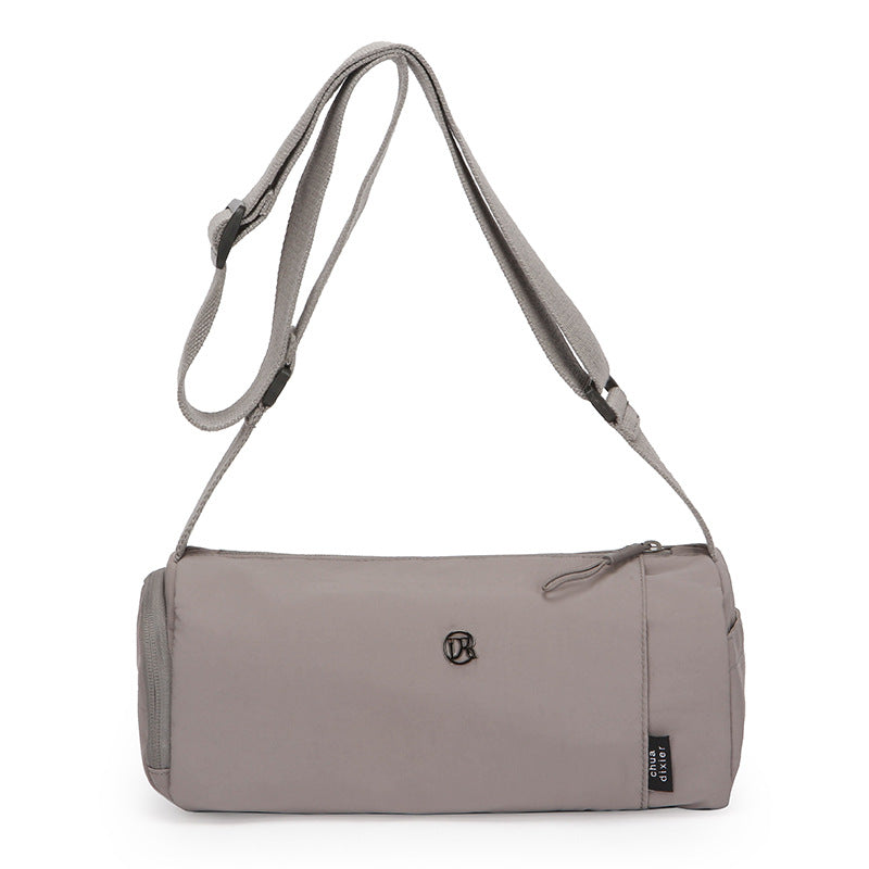 Simple Japanese shoulder bag women's nylon anti-splashing cylinder pillow bag trendy cool messenger bag commuter portable handbag