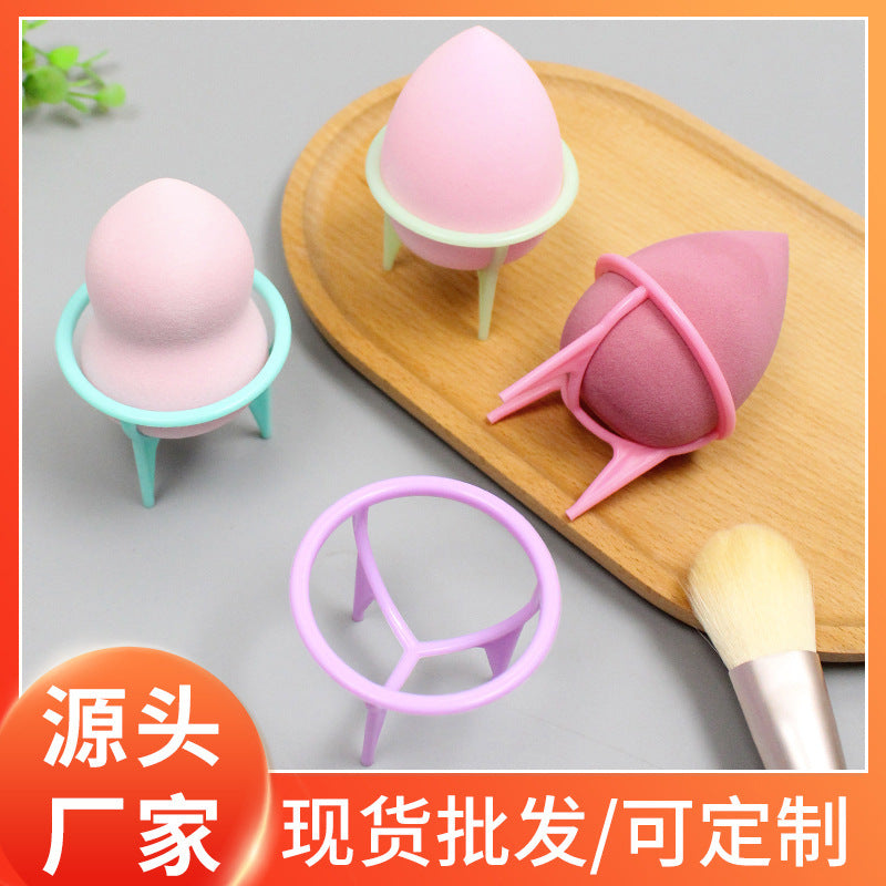 Manufacturer's source of beauty egg holder, plastic shelf, three-legged drying rack, powder puff shelf, beauty egg holder storage holder