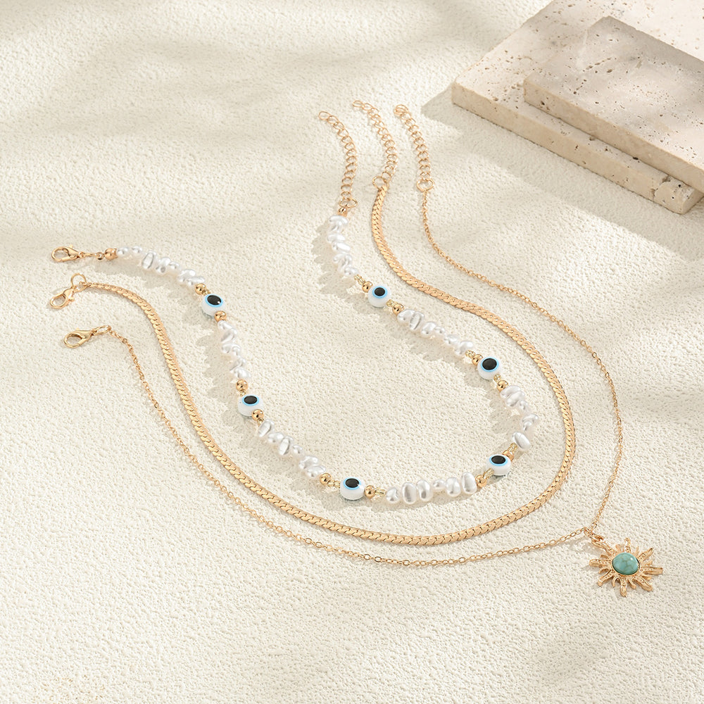 Long pearl necklace wholesale, european and american cross-border vintage eight-pointed star layered jewelry pendant, women's high-end collarbone chain