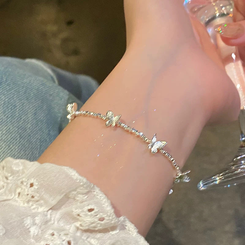 Elegant butterfly bracelet with crushed silver beads - 2026 new arrival, light luxury, niche design, exquisite and high-end style, wholesale for women