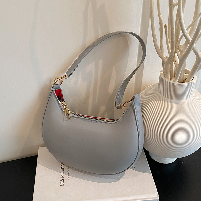 Simple and versatile girl underarm bag 2025 spring new French trend shoulder bag commuter women's bag  trend