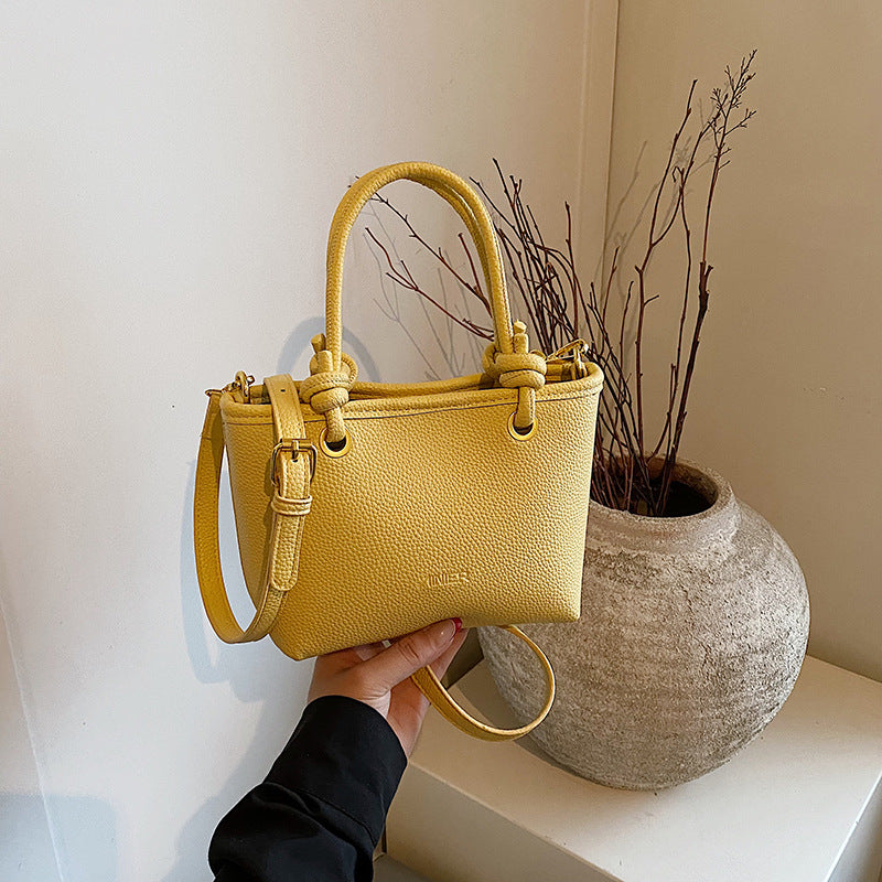 Foreign trade advanced sense hand carrying bucket bag 2025 summer simple and versatile shoulder bag trendy niche design messenger bag