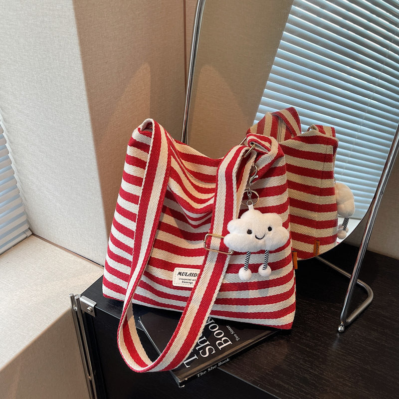 Cross-border striped bag women's large capacity 2025 new summer versatile casual messenger bag college student class tote bag