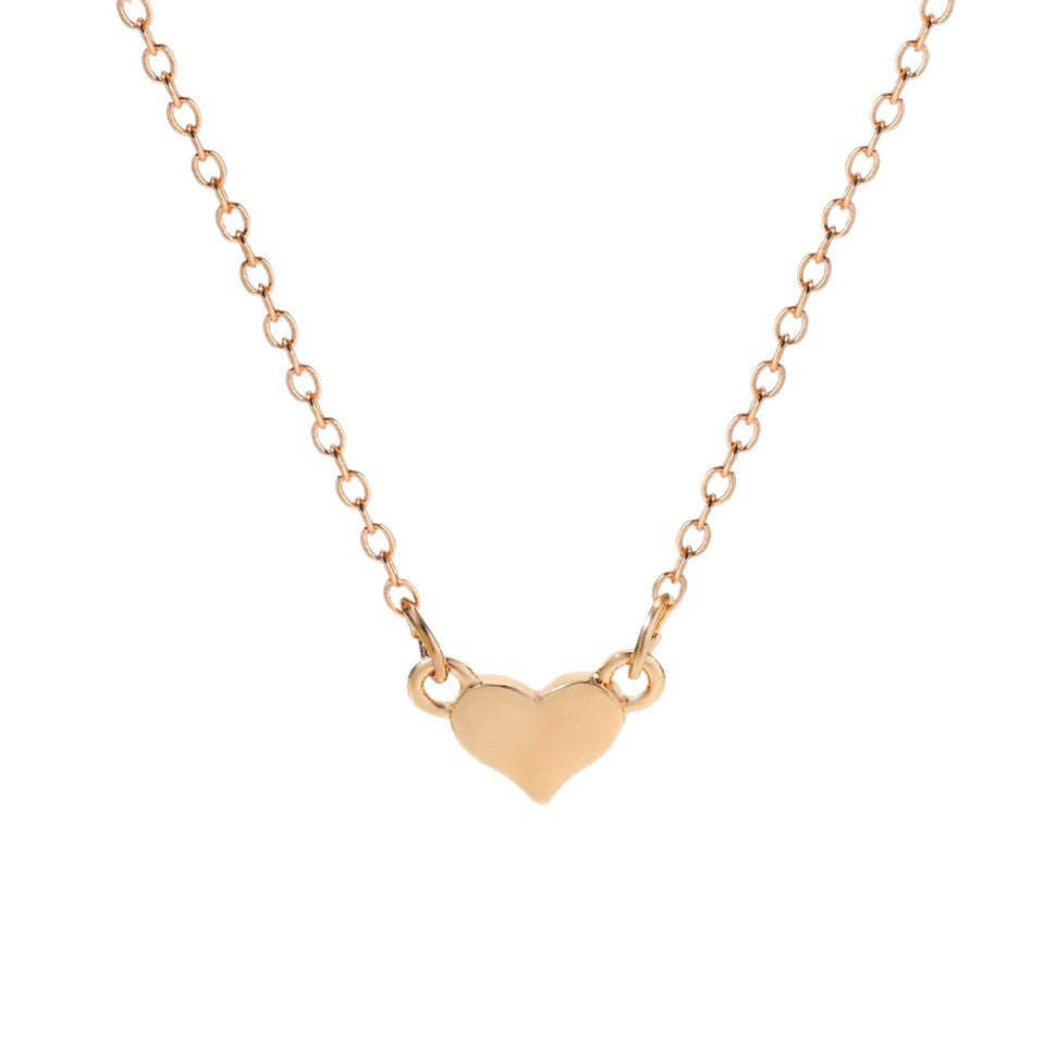 Wholesale metal heart necklace - european & american style, minimalist, versatile jewelry for women, unique & chic, fashionable metal peach heart necklace