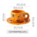 Creative halloween-themed ceramic cup and saucer set, featuring an irregular design with pumpkin and bat motifs. perfect for coffee or tea