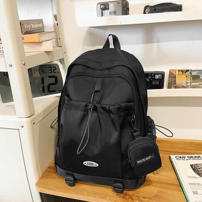 Trendy high-street water-resistant lightweight backpack - 26l large capacity student schoolbag, durable with free headphone pouch