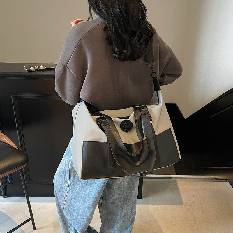 Cross-border fashion large-capacity travel bags, light travel, hand luggage bags, outdoor camping storage, messenger bags wholesale