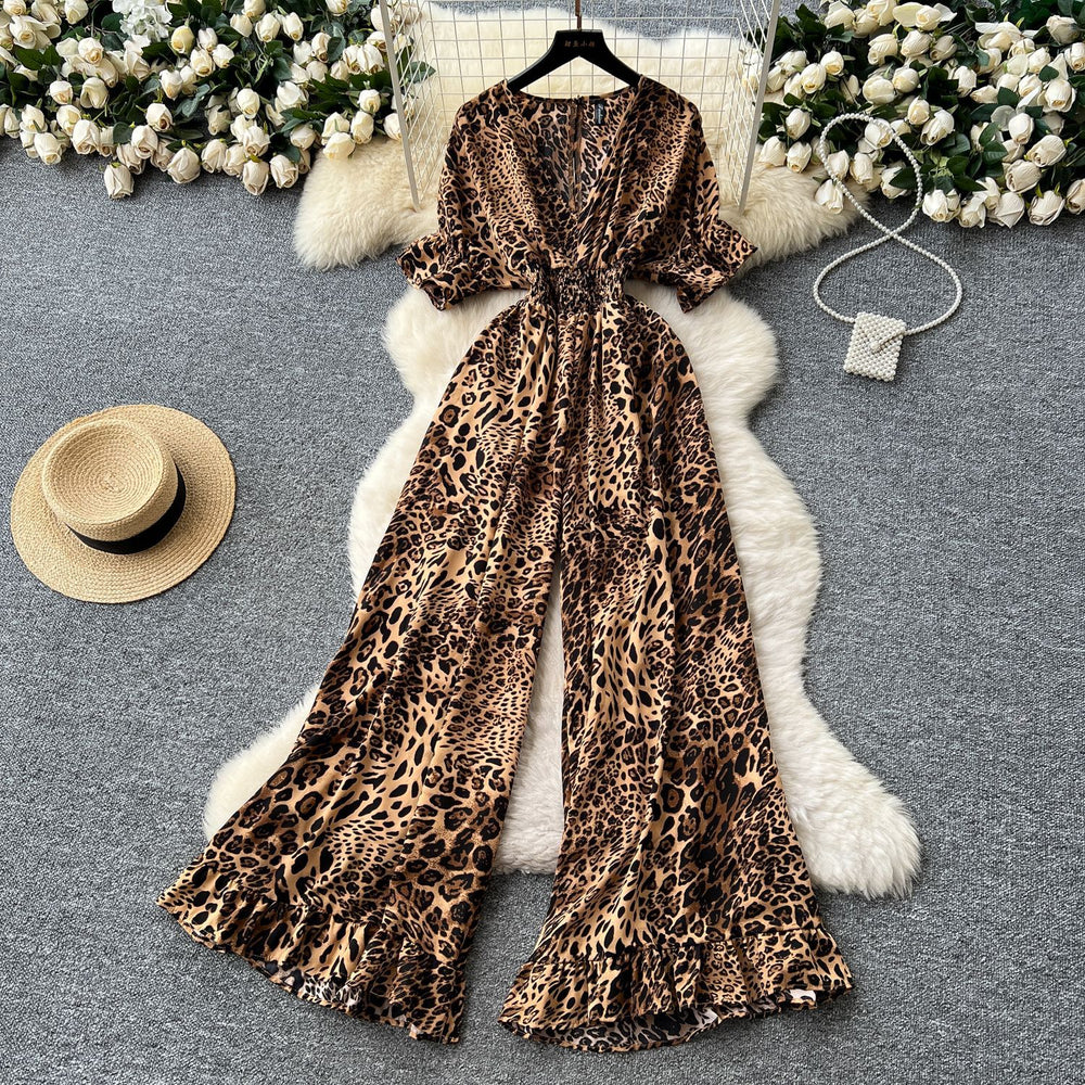 Summer vacation chic: effortless & mature casual v-neck short sleeve jumpsuit with elastic waist, high waist, slimming wide leg, and printed design