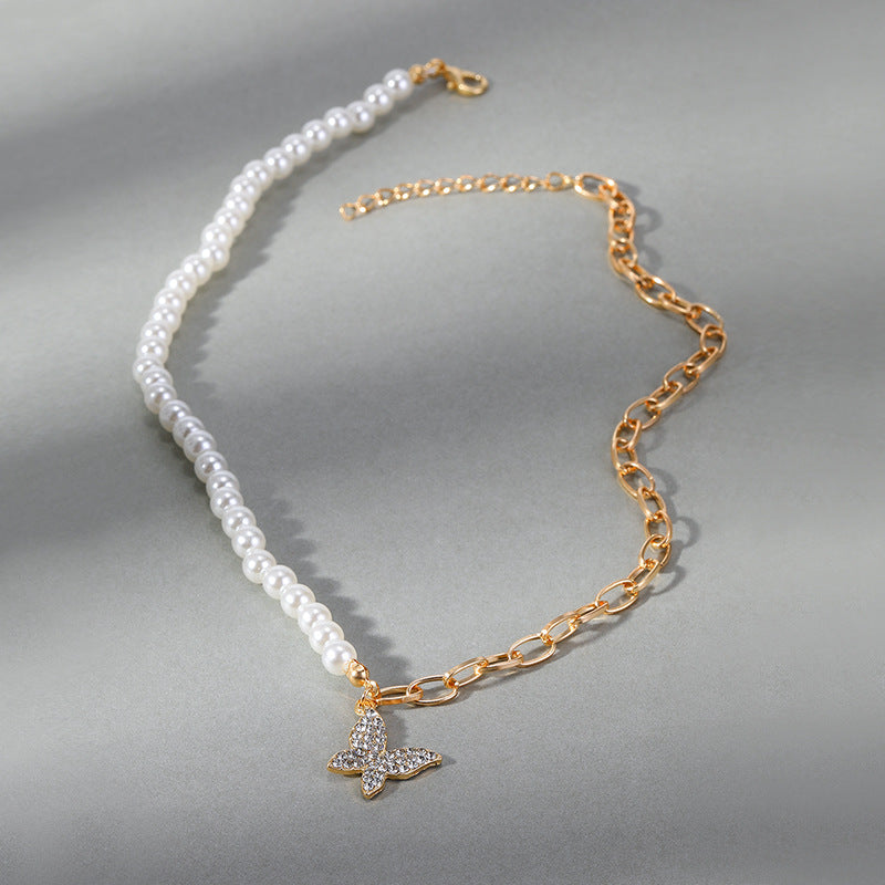 Wholesale korean-style necklace: trendy ins jewelry for autumn/winter. versatile, diamond-studded butterfly pearl sweater necklace with a chic, chanel-inspired design for women