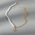 Wholesale korean-style necklace: trendy ins jewelry for autumn/winter. versatile, diamond-studded butterfly pearl sweater necklace with a chic, chanel-inspired design for women