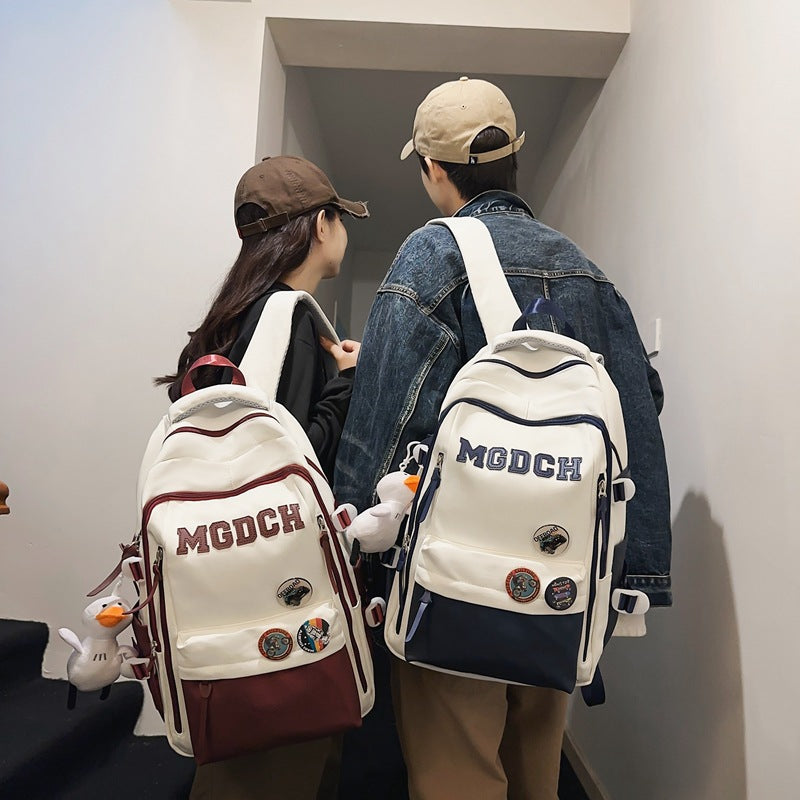 New middle and high school students backpack large capacity lightweight weight backpack simple and strong anti-splashing backpack