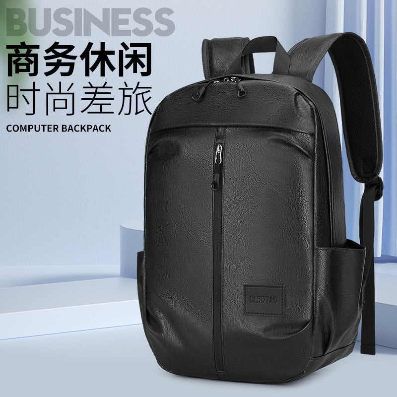 New business Korean version of junior high school students backpack men's large capacity simple PU outdoor travel computer backpack