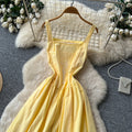 Vacation style yellow suspender lacedress female summer pure lust style waist slimming lookhigh waist long skirt sense of design