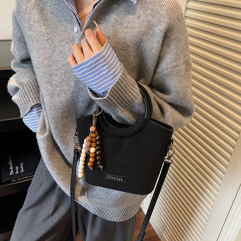 Super hot retro fashion bucket bag 2025 autumn niche design leopard print elegant handbag trendy versatile shoulder bag