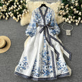 European and american retro court style printed dress - women's designer cinched waist tie-up v-neck lantern sleeve knee-length evening gown