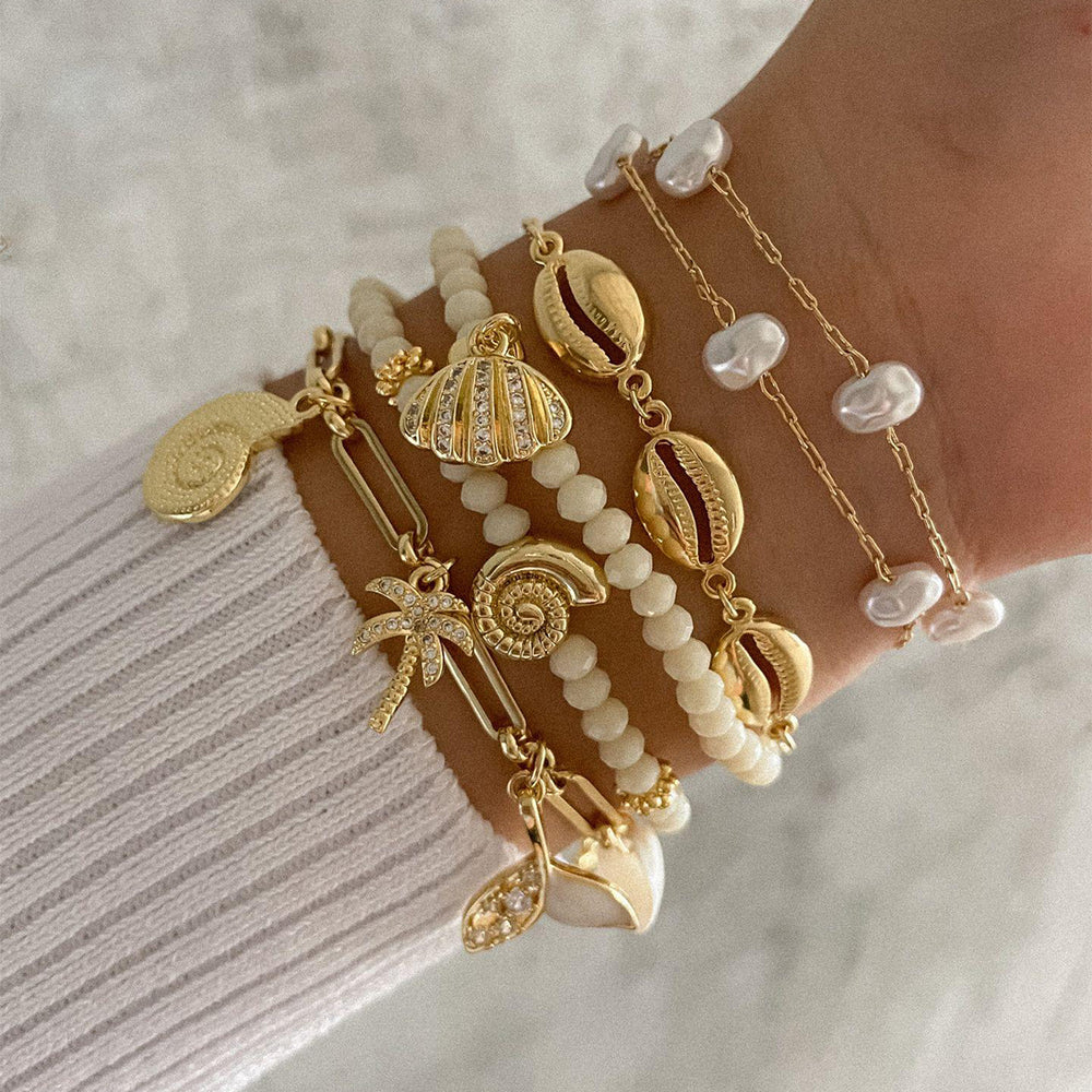 Bohemian bracelet wholesale fashion cross-border bracelet women's rice beads alloy shell pendant niche style bracelet good looks