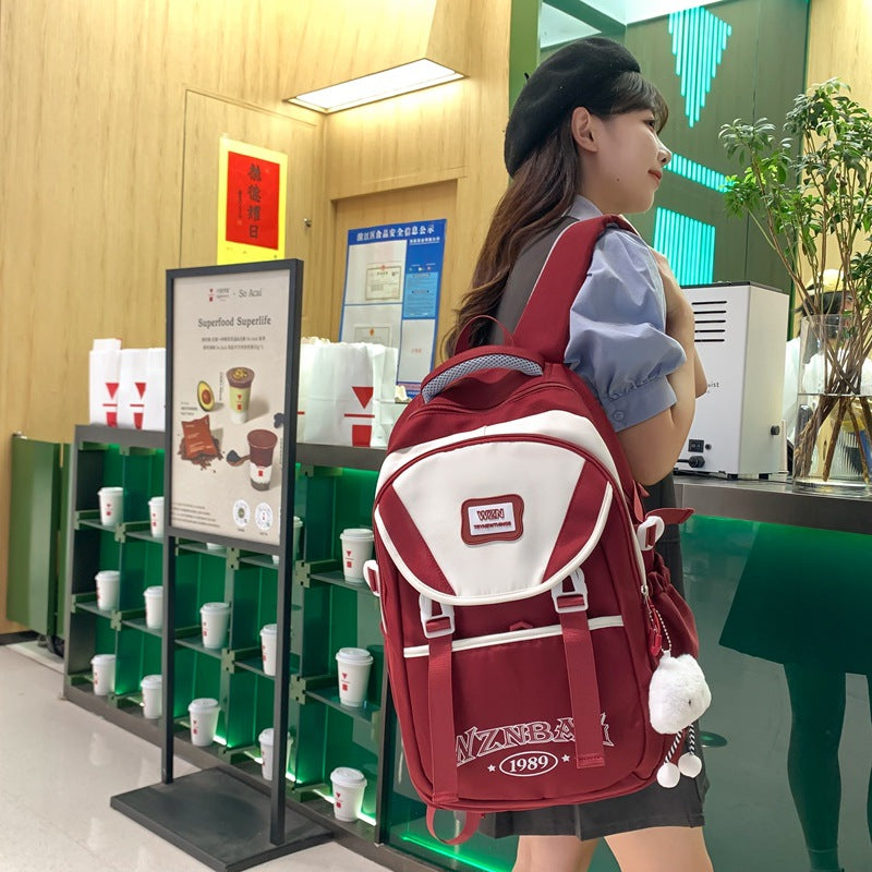 School bag for girls, junior high school students, middle school students, large capacity, versatile burden reduction, fashion trend, high school college students, backpack