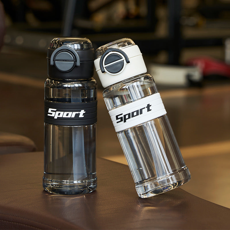 Summer large-capacity sports water bottle handle casual water cup men's and women's plastic cup straw cup bouncing lid space cup