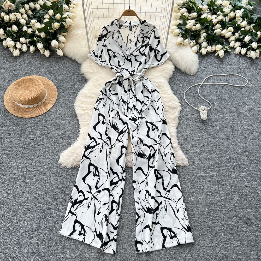Summer outfit: women's vacation-ready fashion - collared short sleeve tie-waist casual printed wide-leg jumpsuit/pants