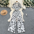 Summer outfit: women's vacation-ready fashion - collared short sleeve tie-waist casual printed wide-leg jumpsuit/pants