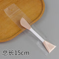 Skin tone: dual-ended silicone brush (spatula + scraper)
