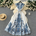 European and american style high-end elegant dress with flutter sleeves, cinched waist, v-neck, single-breasted button detail, and printed design - vintage long dress